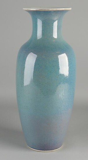 Large Chinese porcelain vase with blue glaze.