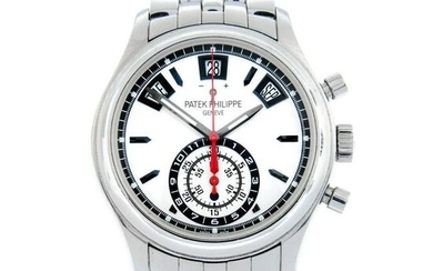 PATEK PHILIPPE - a GMT Annual Calendar chronograph bracelet watch. Stainless steel case with