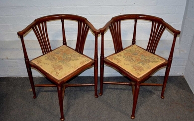 Pair of Edwardian oak corner chairs.
