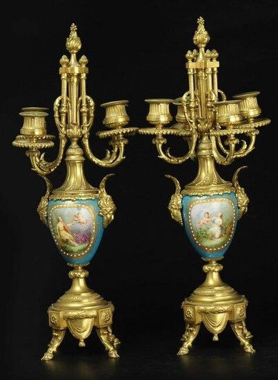 Pair of Sevres jeweled and gilded bronze figural Candelabra with fancy feet