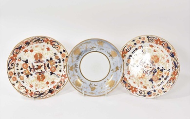 Pair of Wedgwood bone china plates, decorated in Imari style, and a saucer dish, decorated in pale blue and gilt
