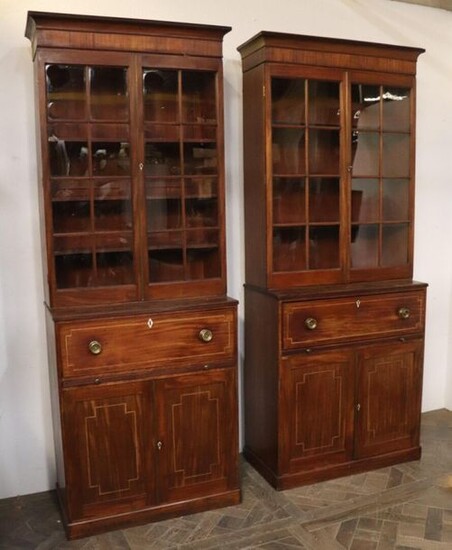 Pair of bookcases in mahogany, mahogany veneer and marquetry of light wood fillets.