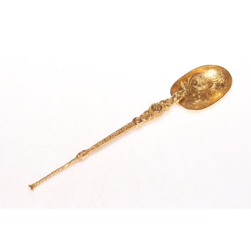 Silver gilt ornate anointing spoon with engraved and embosse...
