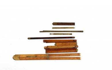 Ten brass/wood rulers