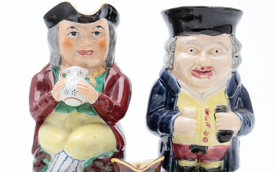 Three English “Toby” jugs, one of them in miniature, in Royal Doulton and Staffordshire earthenware, first half of the 20th Century.