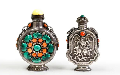 Two Mongolian-style white metal snuff bottles Qing dynasty, 19th century The first...