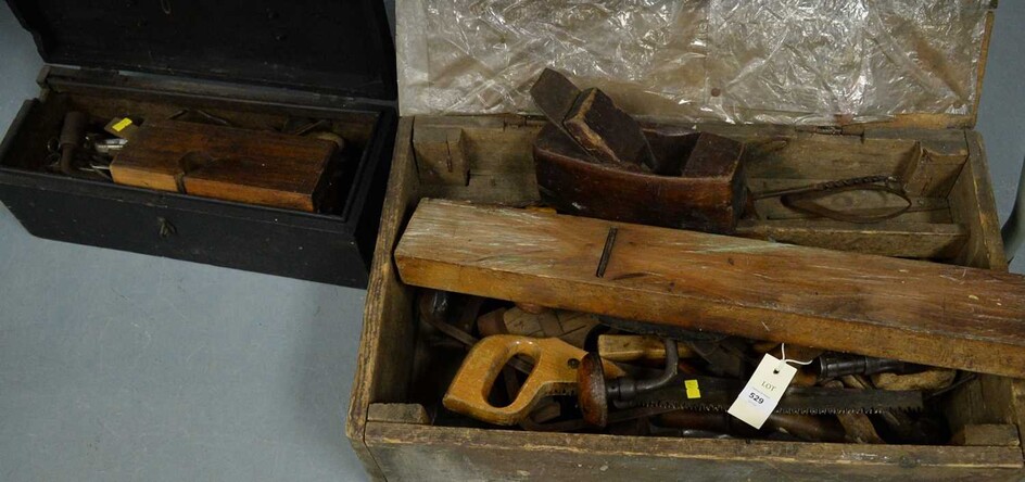 Vintage woodworking plane and other tools.