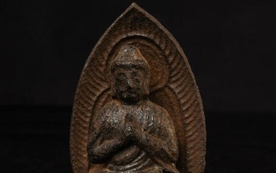 14/15thC Yuan/early Ming cast-iron Buddha with integral mandorla- Rare-Exact in Sothebys