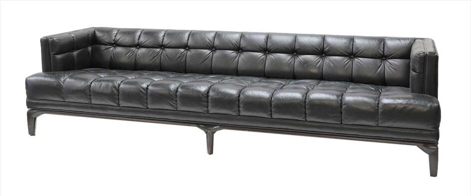 A large black leather button-upholstered settee