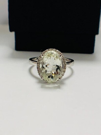 14ct White Gold Aquamarine and Diamond ring featuring...