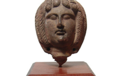 A fantastic Egyptian-Romano head of a woman
