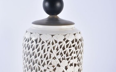 A 19TH CENTURY CHINESE BLANC DE CHINE PORCELAIN RETICULATED LAMP decorated with foliage. 49 cm high.