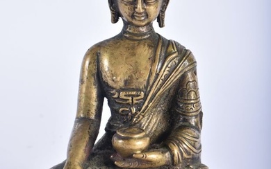 A 19TH CENTURY CHINESE BRONZE FIGURE OF A SEATED BUDDHA modelled upon a lotus capped base. 12 cm x 6