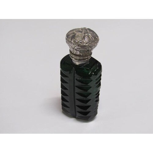 A 19c green glass scent bottle, cut and having a silver hing...