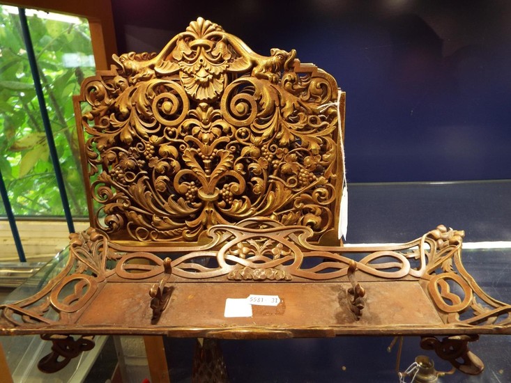 A 19thC French bronze two section letter rack heavily moulde...