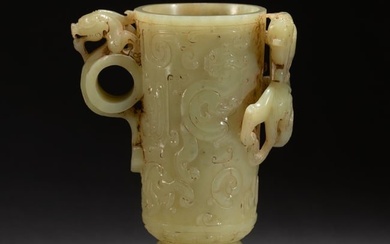 A CHINESE CARVED JADE DRAGONS CUP
