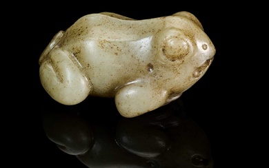 A CHINESE CELADON JADE FROG, LATE MING DYNASTY