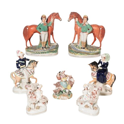 A COLLECTION OF STAFFORDSHIRE FIGURES including jockeys, fig...