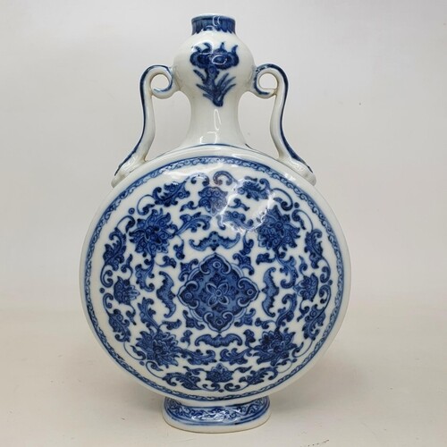 A Chinese blue and white moon flask, character mark to base,...