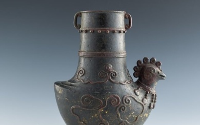 A Chinese bronze 'mythical bird' zun vase, Ming dynasty or earlier