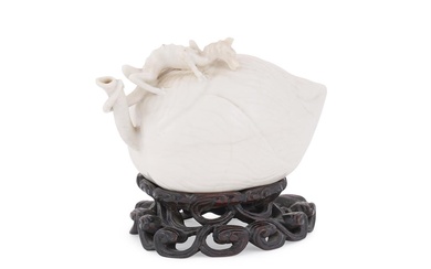 A Chinese white glaze 'Lotus and dragon' water dropper
