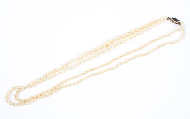 A Continental double strand of graduating synthetic pearls