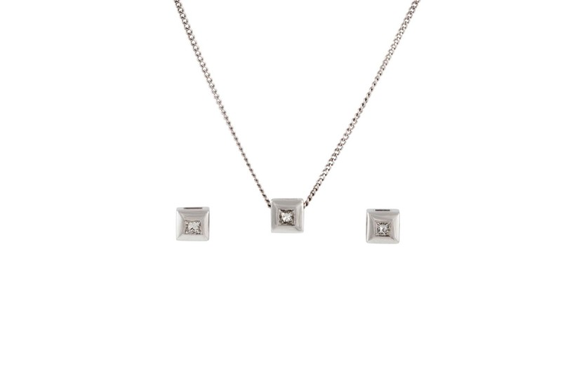 A DIAMOND SET PENDANT AND MATCHING EARRINGS, of approx. 0.30...