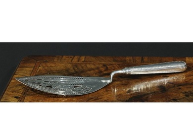 A George III silver fish slice, the navette shaped blade pie...