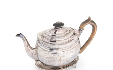A George III silver tea pot with associated stand