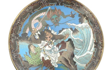 A Japanese cloisonné enamel dish, decorated in colours with a warrior fighting...