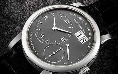A. LANGE & SÖHNE. AN 18K WHITE GOLD WRISTWATCH WITH OVERSIZED DATE AND POWER RESERVE INDICATION LANGE 1 MODEL, REF. 101.030, CIRCA 2009