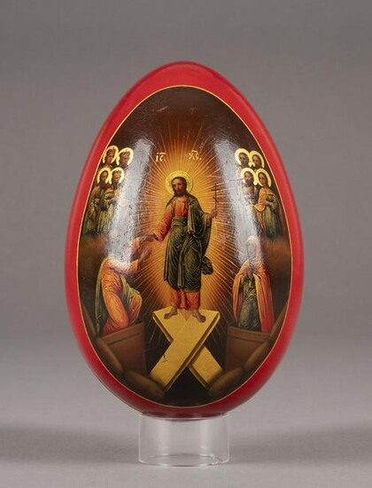 A LARGE PAPIER-MACHÃ‰ AND LACQUER EASTER EGG SHOWING