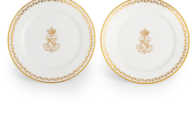 A PAIR OF ATELIER PAINTED ARMORIAL SEVRES PORCELAIN PLATES, THE PORCELAIN 1840-1850 CIRCA, THE PAINTING 20TH CENTURY; SLIGHTLY WORN