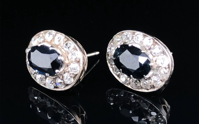 A PAIR OF EARLY 20th CENTURY SAPPHIRE AND DIAMOND CLUSTER STUD EARRINGS. ESTIMATED APPROX. TOTAL