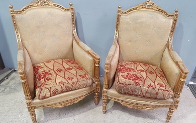 A PAIR OF GILT FRAMED FRENCH STYLE PARLOUR CHAIRS