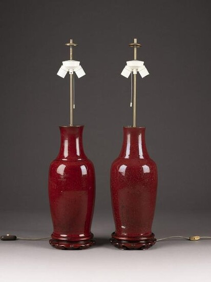 A PAIR OF RED GLAZED VASE AS LAMPS