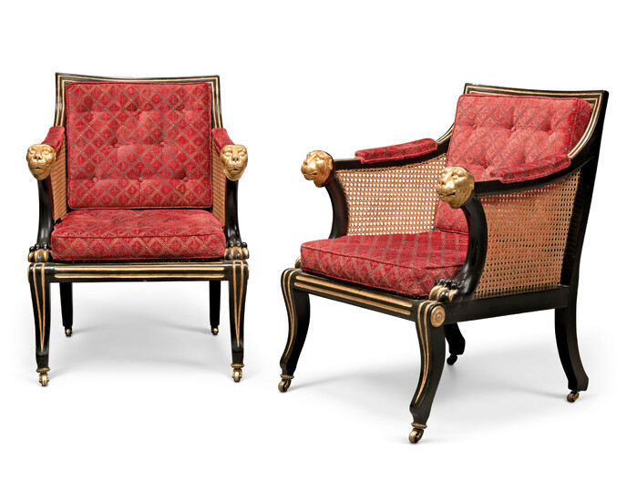 A PAIR OF REGENCY REVIVAL PARCEL-GILT AND 'BRONZED' CANED LIBRARY BERGERES