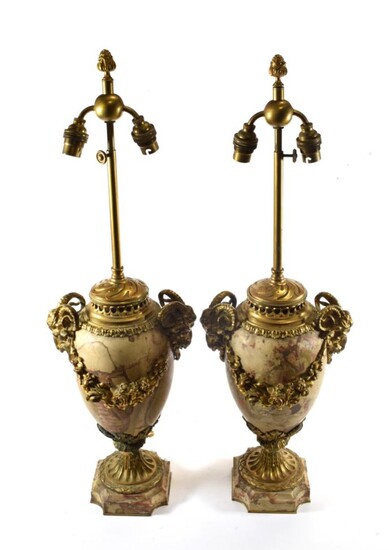 A Pair of Gilt Metal Mounted Marble Lamp Bases, in Louis XVI style, of ovoid form with ram's...