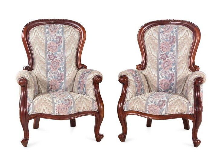 A Pair of Victorian Style Carved Walnut Armchairs