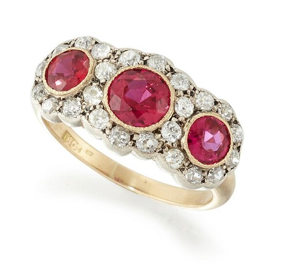 A RUBY AND DIAMOND CLUSTER RING, three graduated