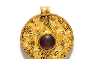 A Roman Gold Pendant with a Garnet Cabochon