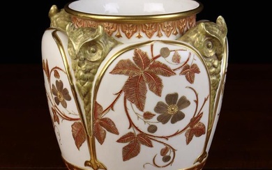 A Royal Worcester Ivory Ground Vase. The sides having four arch topped panels decorated with a conti