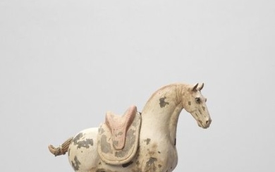 A TL TESTED TERRACOTTA MODEL OF A HORSE,...