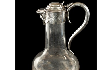 A VICTORIAN SILVER MOUNTED GLASS CLARET JUG with star-cut bu...