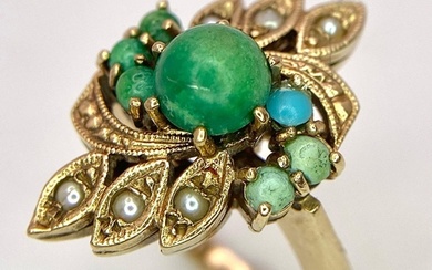 A VINTAGE 9K GOLD RING DECORATED WITH TUQUOISE AND SEED PEAR...