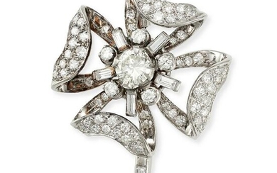 A VINTAGE DIAMOND FLOWER BROOCH in 18ct white gold, designed as a flower set to the centre with a