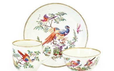 A Worcester Porcelain Coffee Cup, Tea Bowl and Saucer, decorated...