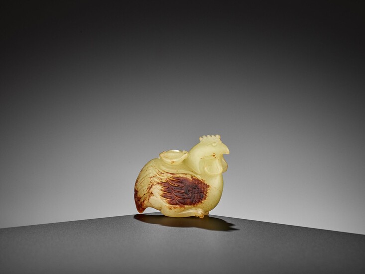 A YELLOW AND RUSSET JADE FIGURE OF A CHICKEN, EARLY QING DYNASTY