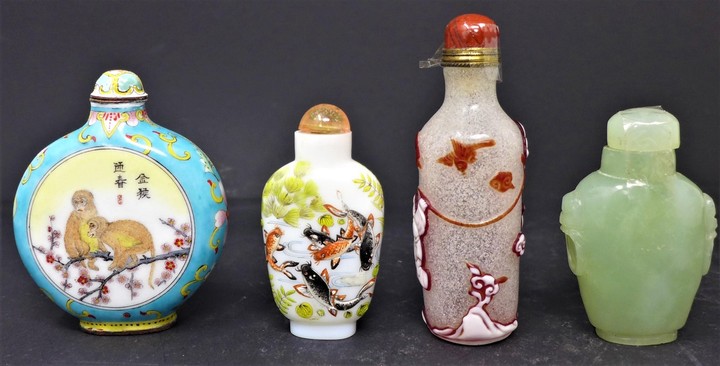 A collection of four 20th century Chinese snuff bottles, H.9...