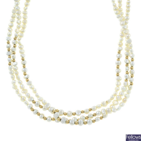 A freshwater cultured pearl three-row necklace.